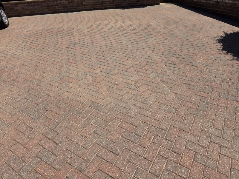 Close view of herringbone block paving laid by Green Leaf Landscape Services