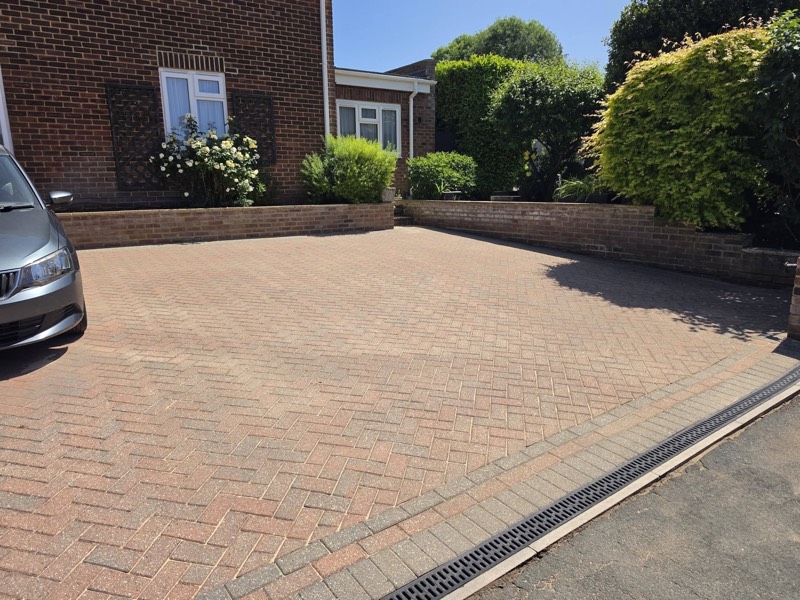 New block paved driveway with brick edging completed by Green Leaf Landscape Services